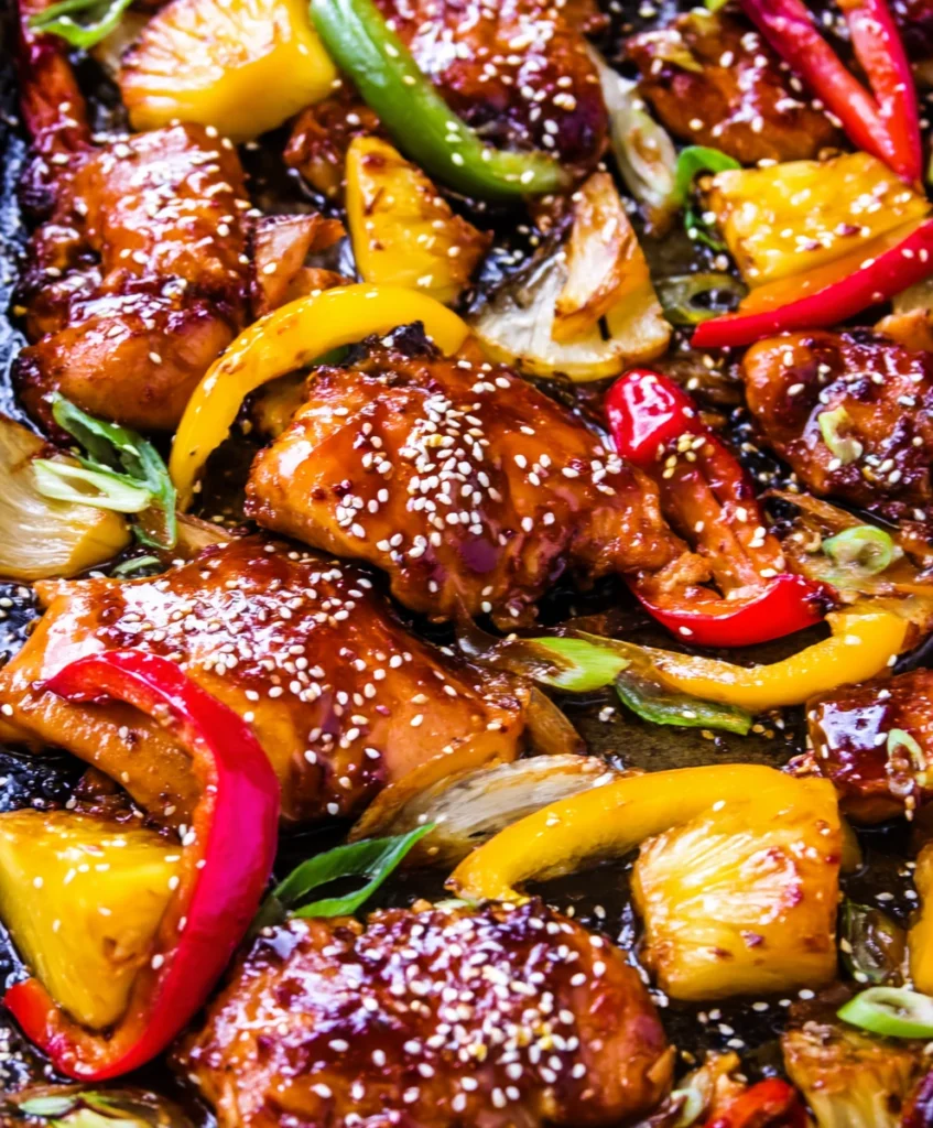 Effortless Sheet Pan Korean BBQ Chicken and Pineapple with Sesame-Ginger Glaze 1 Sheet Pan Korean BBQ Chicken and Pineapple with bell peppers, glistening with a sesame-ginger glaze, ready to eat.